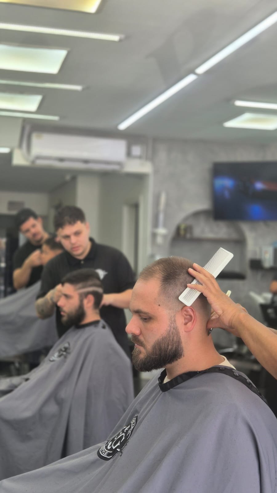 Atendimento na Barbearia BG
